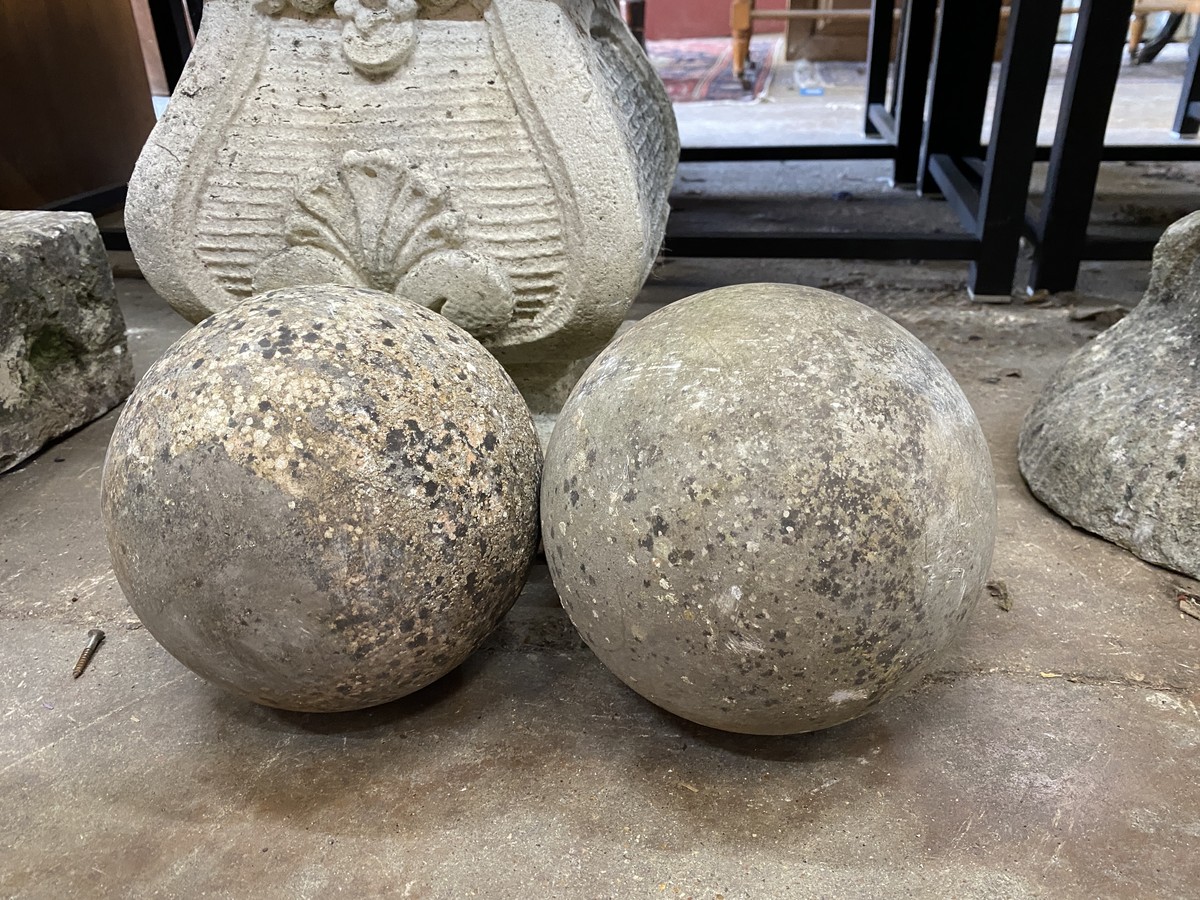 Two stone decorative garden balls, height 20cm